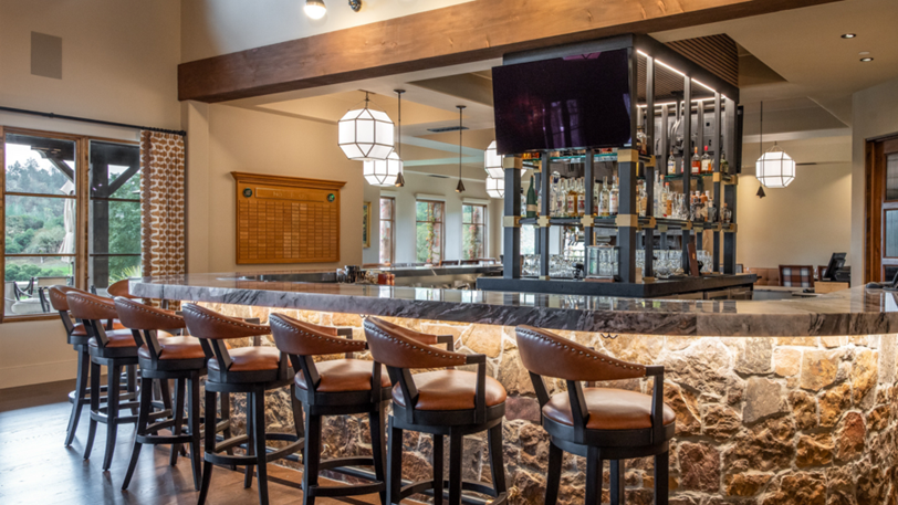 A commercial bar and grill space with professiona AV systems installed.