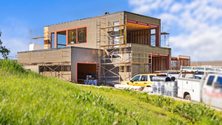 A luxury home in the process of construction with smart home automation installations.